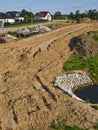 Construction of a floodbank or levee along a river