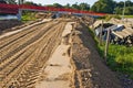 Construction of a floodbank or levee along a river