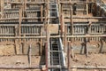 Construction of floor beams Construction using temporary wood logs, plywood at the site. Reinforced rebar to strengthen the