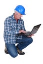 Construction foreman embracing technology Royalty Free Stock Photo