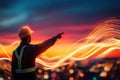 Construction Foreman Pointing Towards Horizon at Sunset with Colorful Light Trails Royalty Free Stock Photo