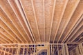During construction of framing beam layout joists supports truss a framework for wooden new house Royalty Free Stock Photo