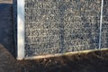 Construction of a gabion retaining wall, as part of the fencing home coarser gravel filled poured between two wire slabs. stones p Royalty Free Stock Photo