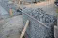 construction of a gabion retaining wall, as part of the house fencing.
