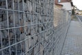 construction of a gabion retaining wall, as part of the house fencing.
