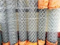 Construction grid a chain-link in rolls. Wicker fence metal bar fence, rabitz Royalty Free Stock Photo