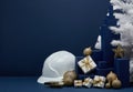 Construction hard hat and Christmas decorations. Christmas and New Year construction Royalty Free Stock Photo