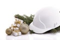 Construction hard hat and Christmas. Royalty Free Stock Photo