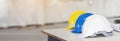 Construction hard hat safety tools equipment for workers in construction site for engineering protection head standard. Many hard Royalty Free Stock Photo