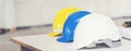 Construction hard hat safety tools equipment for workers in construction site for engineering protection head standard. Many hard Royalty Free Stock Photo