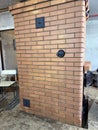 Construction of a heating stove. Rear side. Final work. Royalty Free Stock Photo