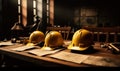 Construction helmets and blueprints on the table