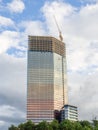 Construction of a high-rise building. Skyscraper glazing. Modern technologies. High buildings. Installation of windows Royalty Free Stock Photo