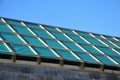 Construction of house is finished on each floor with a green tree branch. vapor permeable insulation under battens on which roof t