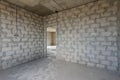 Construction of an individual residential building, view of the corner of a room with a doorway