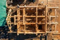 Construction industry concept. Timber wooden frame of house from bar, foundations of villas. Aerial top view Royalty Free Stock Photo