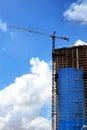 Construction industry image of tall cranes and building exterior Royalty Free Stock Photo