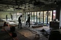 Construction industry workers working inside modern building site in vietnam