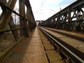 Construction of iron bridge across the river in deep forests in the midle of Europe