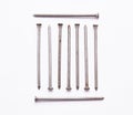 Construction, iron nails on white isolated background. Close up. The view from the top Royalty Free Stock Photo
