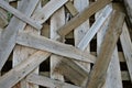 Construction jumble abstract background. Pile of boards scattered and mixed. Close-up