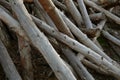 Construction jumble abstract background. Pile of logs scattered and mixed. Close-up