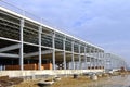 Construction of a large logistics complex made of metal structures. The frame of the building is in the process of Royalty Free Stock Photo