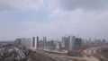 Construction of a large residential area. The construction site is visible. Multi-storey buildings and infrastructure under constr