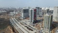 Construction of a large residential area. The construction site is visible. Multi-storey buildings and infrastructure under constr