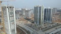 Construction of a large residential area. The construction site is visible. Multi-storey buildings and infrastructure under constr