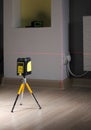 Construction laser level on a mini tripod Royalty Free Stock Photo