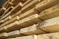 Construction lumber. Dry boards are stacked. A close-up of wood in the end. the woodworking industry and sawmills