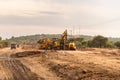 Construction machinery on the construction of a new road at the