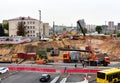 Construction machinery and equipment on construction site. Temporary traffic regulation from carrying out road works. Minsk,