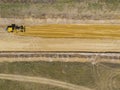 Construction machinery makes a new road in the field Royalty Free Stock Photo