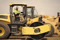 construction machinery worker outdoor. machinery in manufacturing industry with construction worker. construction worker