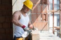 Construction Man Hitting Wood With Hammer Royalty Free Stock Photo