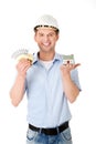 Construction man holding house model and money Royalty Free Stock Photo