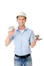 Construction man holding house model and money Royalty Free Stock Photo