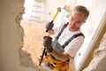 Construction man using hammer Royalty Free Stock Photo