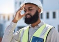 Construction, man and worker with headache, stress of building renovation and civil engineering mistake. Tired face of Royalty Free Stock Photo