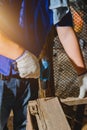 Construction man workers in blue shirt with Protective gloves and working with power drill Royalty Free Stock Photo