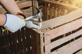 Construction man workers in blue shirt with Protective gloves working with hammer Royalty Free Stock Photo