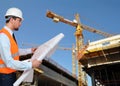 Construction manager/ engineer planning house construction Royalty Free Stock Photo