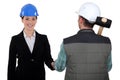 Construction manager and worker