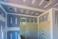 Renovation construction of master bathroom with new under construction bathroom interior drywall Royalty Free Stock Photo