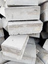 Construction Materials. Photo heap bricks. Gray texture, stone background