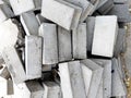 Construction Materials. Photo heap bricks. Gray texture, stone background
