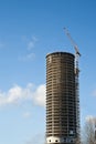 Construction of modern building. Construction plant with crane.