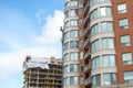 Construction of the modern condo buildings with huge windows and balconies Royalty Free Stock Photo